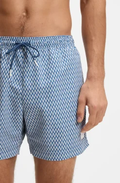 Printed swim shorts with logo badge