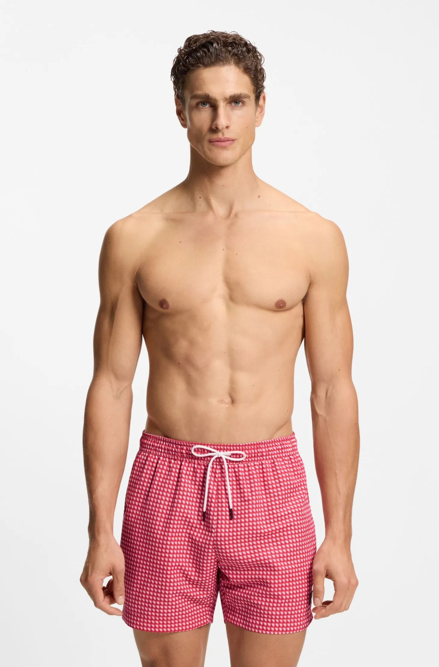 Printed swim shorts with logo badge