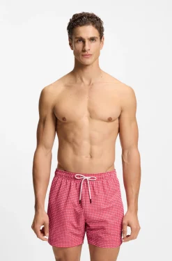 Printed swim shorts with logo badge