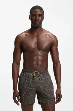 Printed swim shorts with logo badge