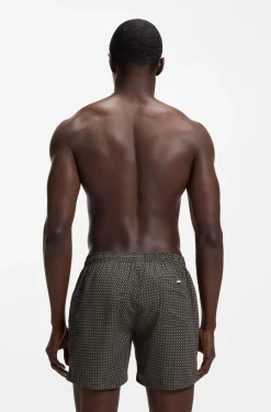 Printed swim shorts with logo badge