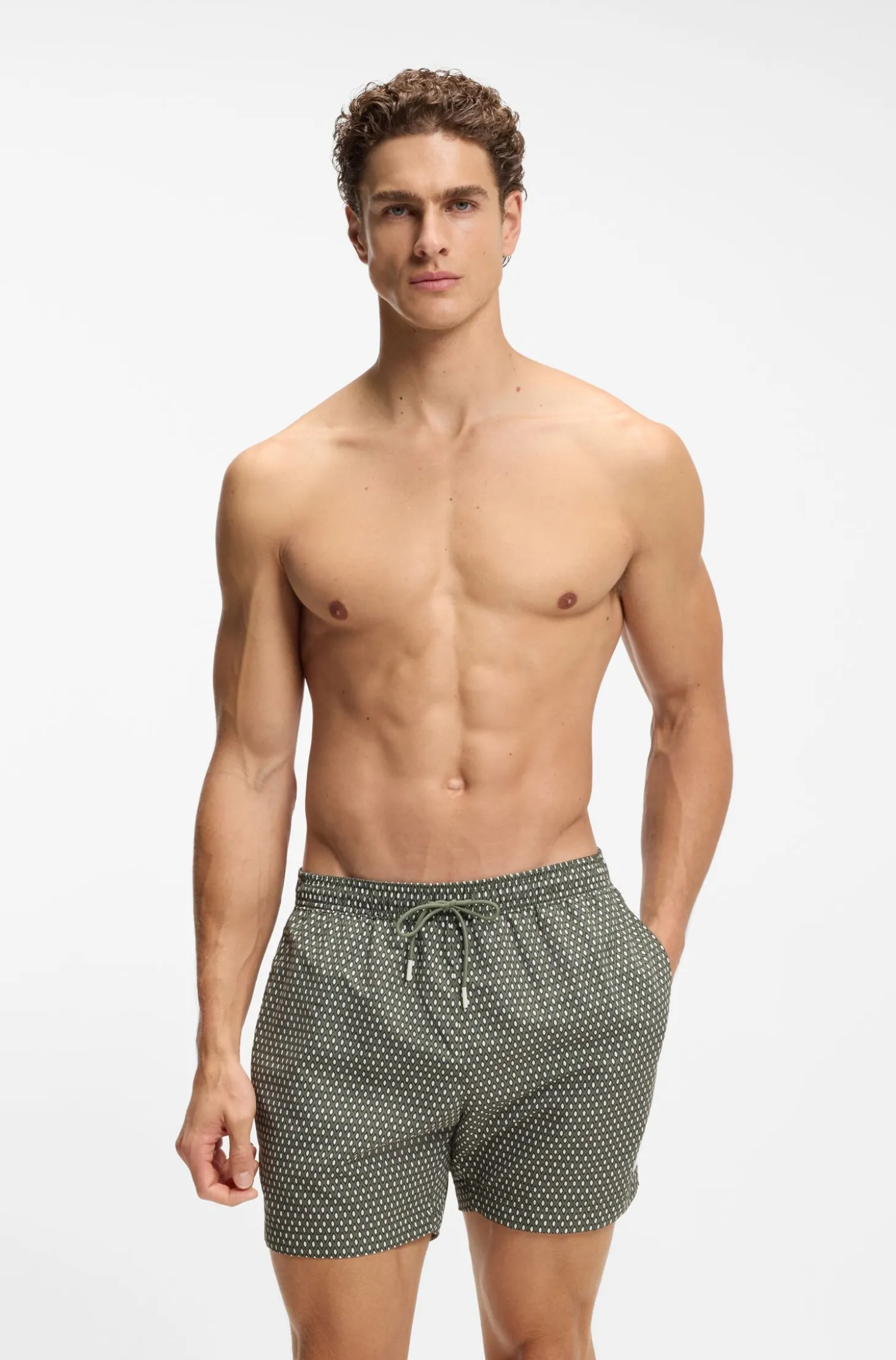 Printed swim shorts with logo badge