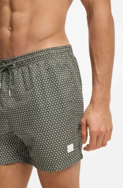 Printed swim shorts with logo badge