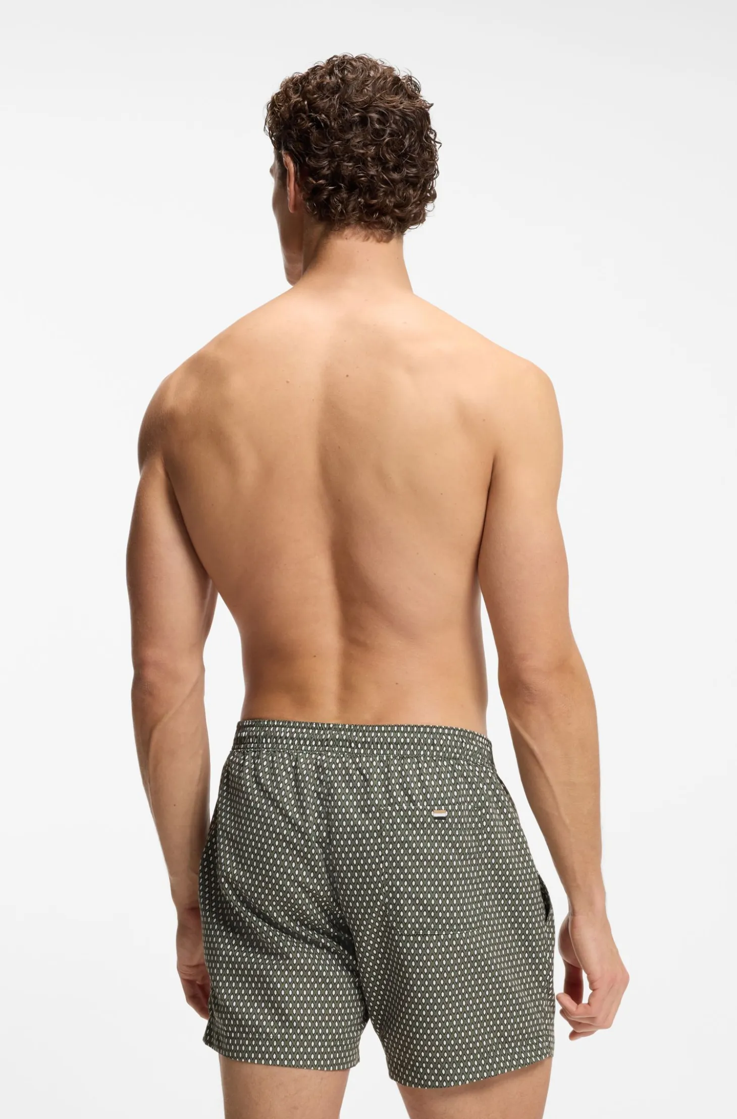 Printed swim shorts with logo badge