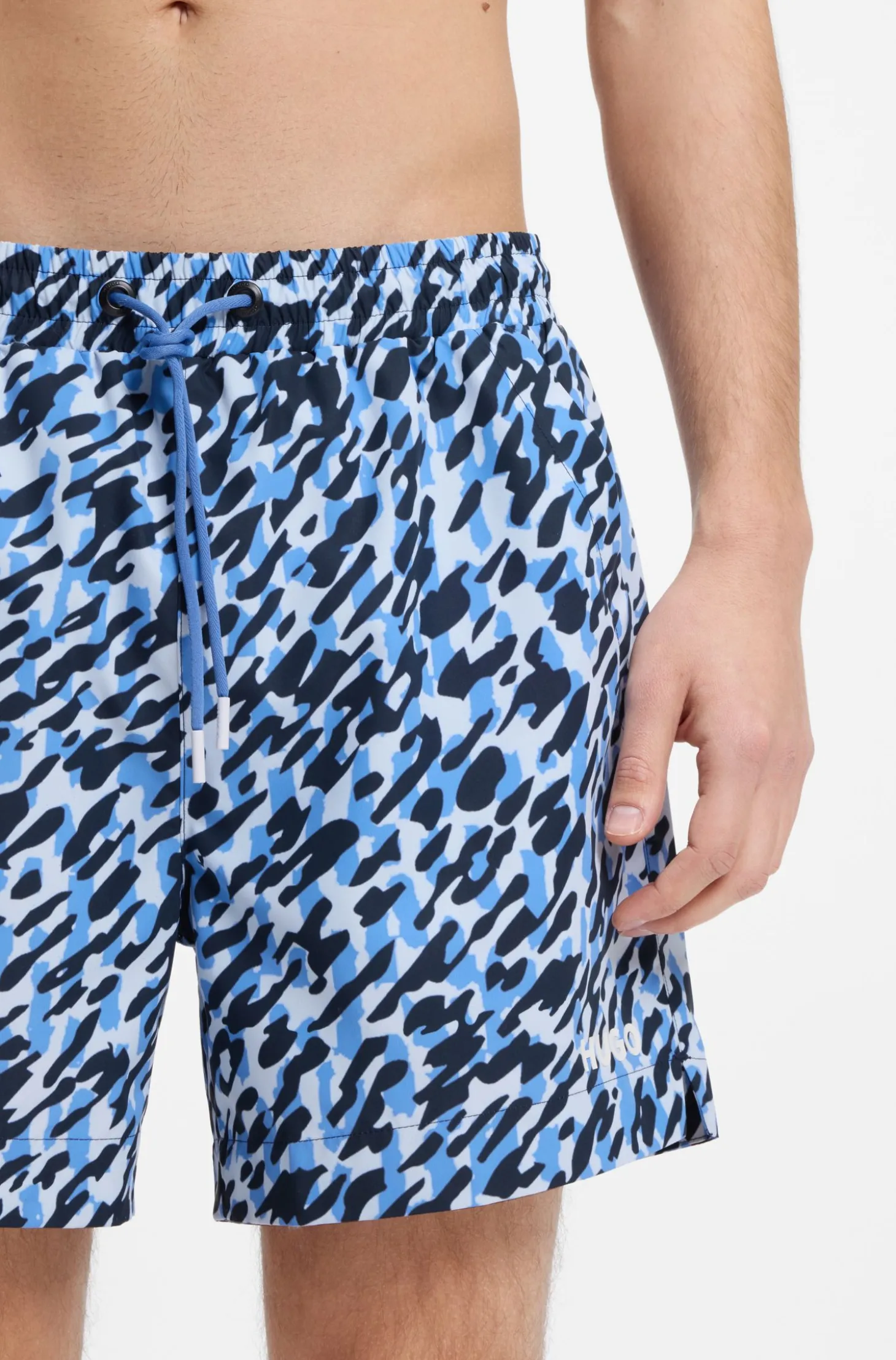 Quick-dry swim shorts with all-over print
