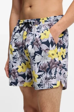 Quick-dry swim shorts with all-over print