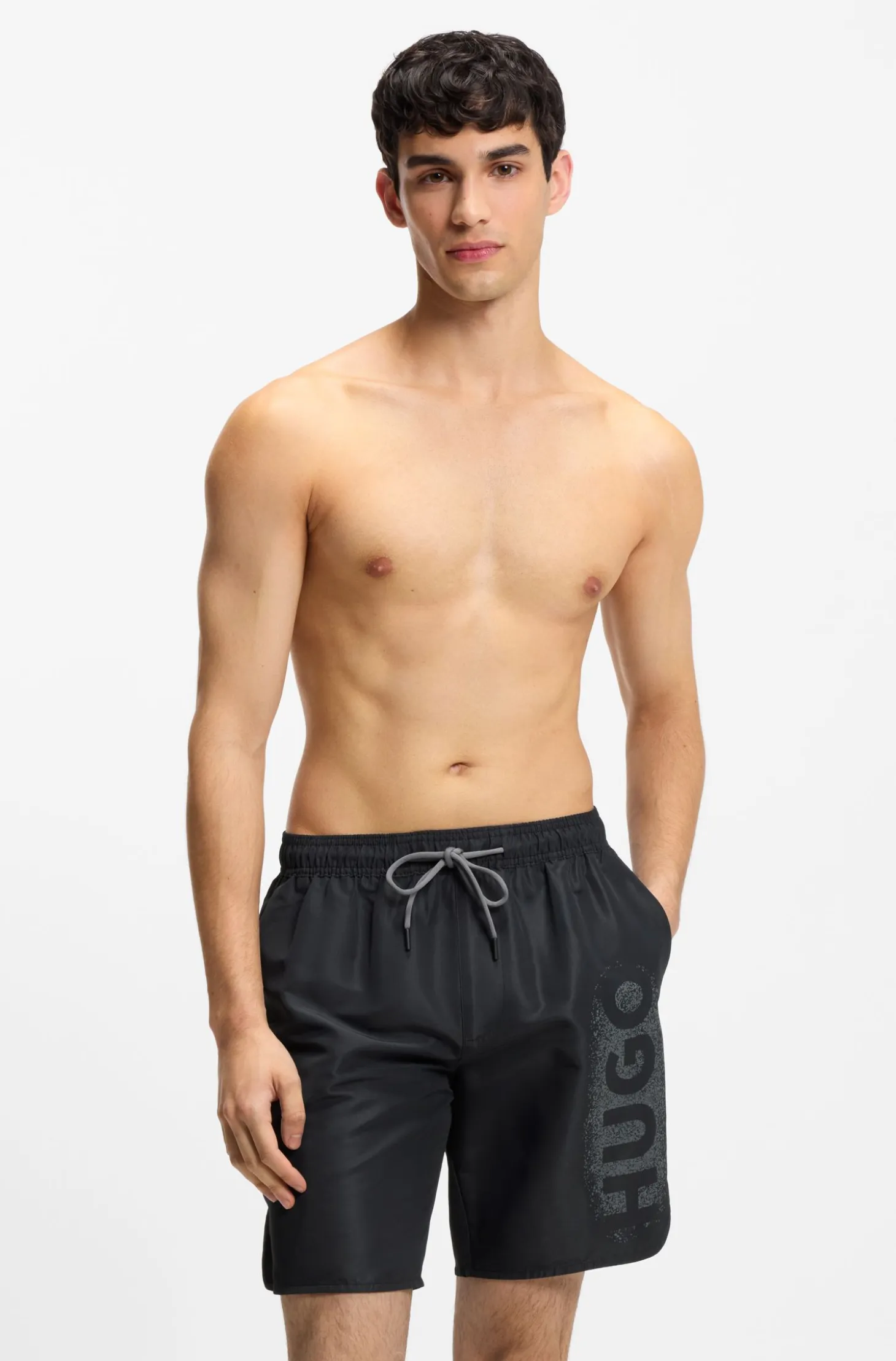Quick-dry swim shorts with spray-effect logo