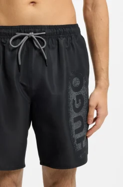 Quick-dry swim shorts with spray-effect logo