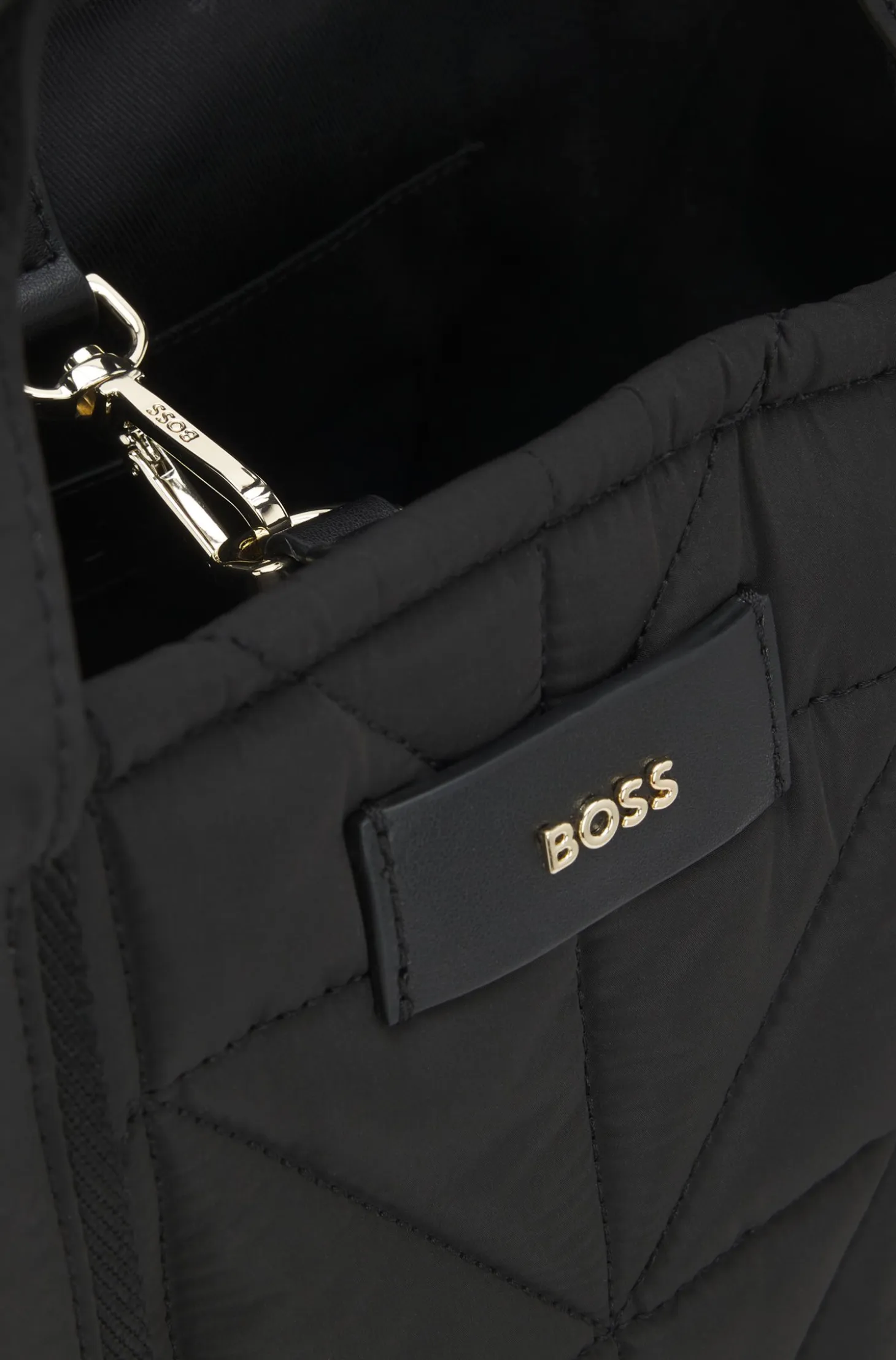 Quilted tote bag with logo patch