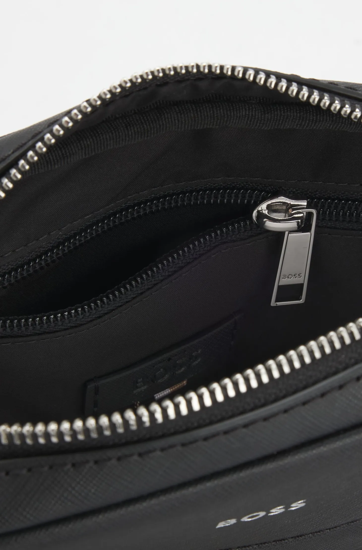 Recycled-leather reporter bag with adjustable logo strap