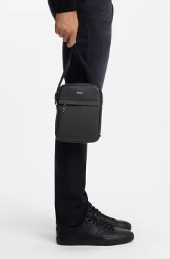 Recycled-leather reporter bag with adjustable logo strap