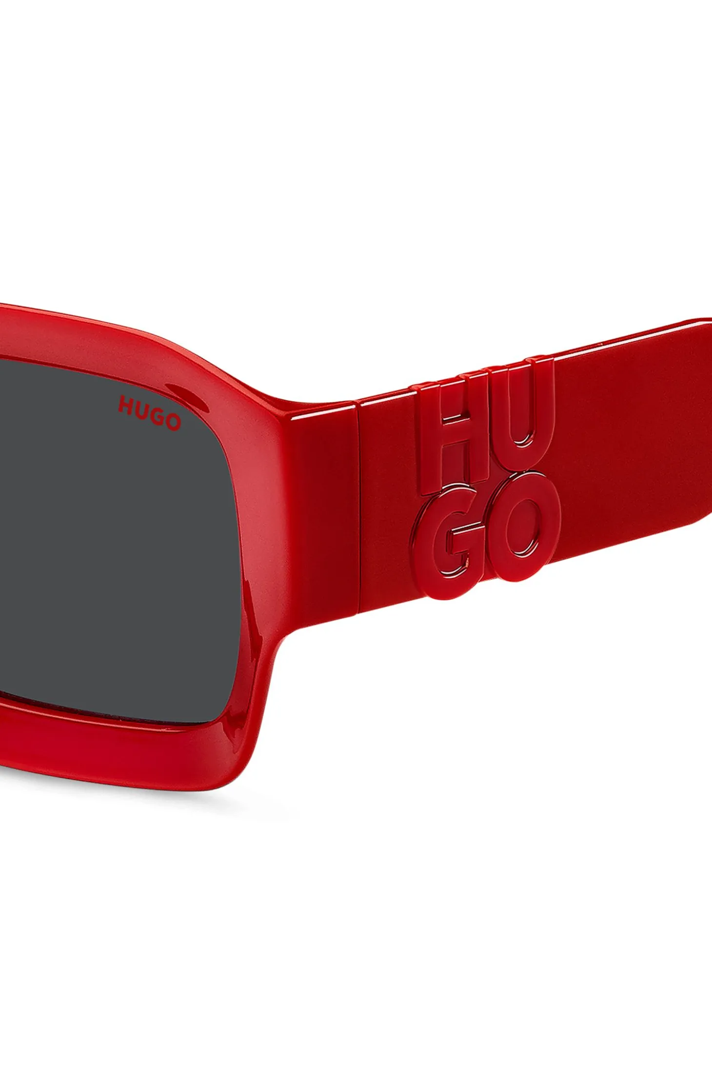 Red sunglasses with stacked-logo temples