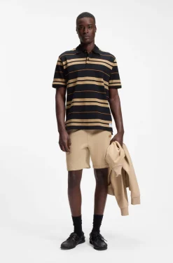 Regular-fit polo in cotton piqué with engineered stripes