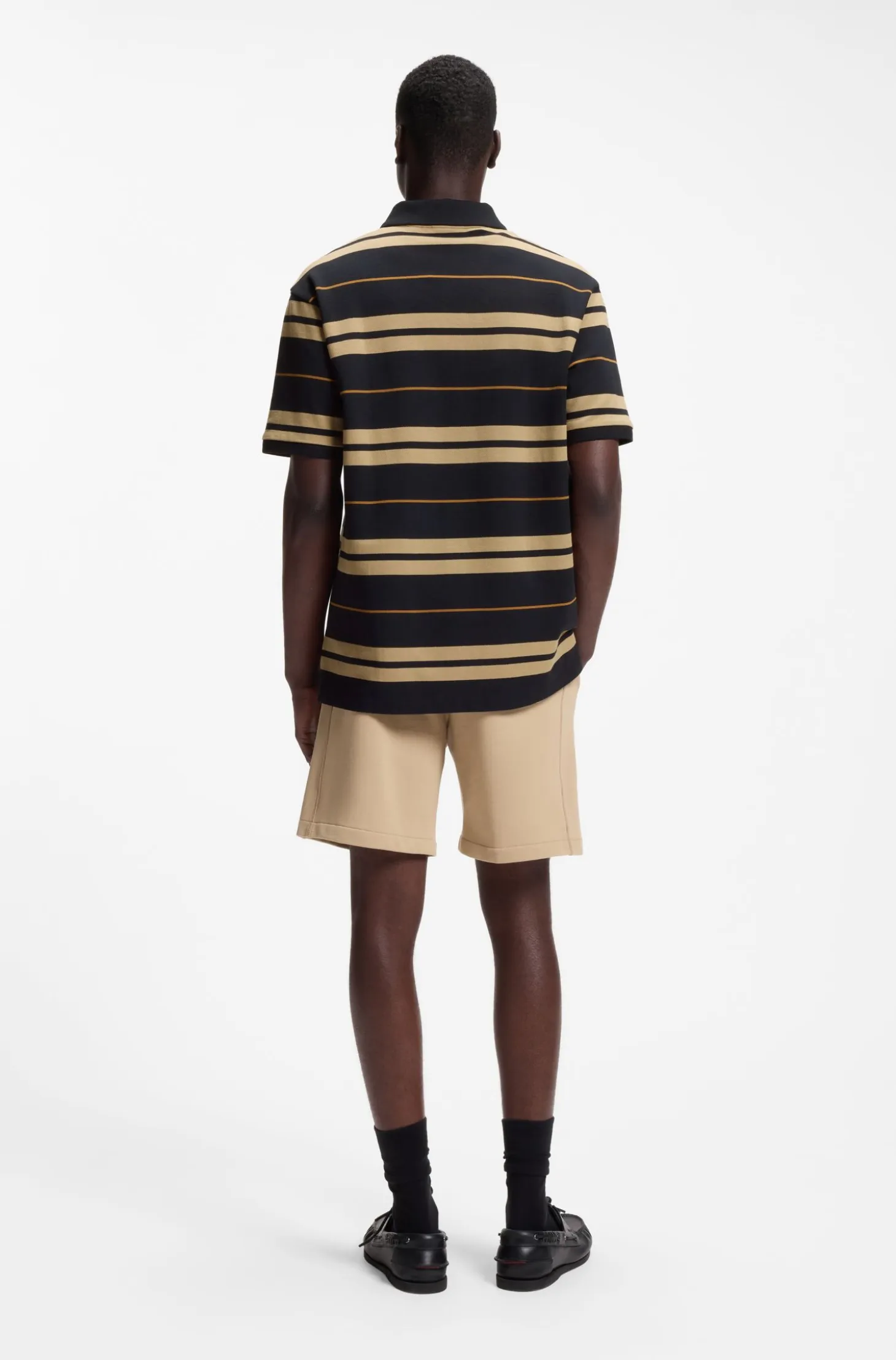 Regular-fit polo in cotton piqué with engineered stripes