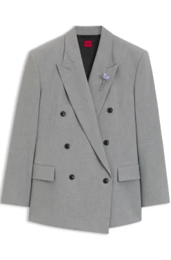 Relaxed-fit blazer with enamel flower brooch