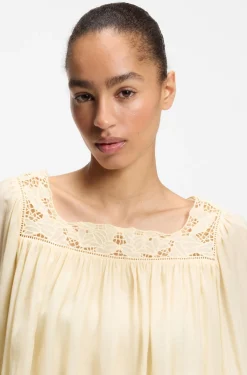 Relaxed-fit muslin dress with embroidered neckline