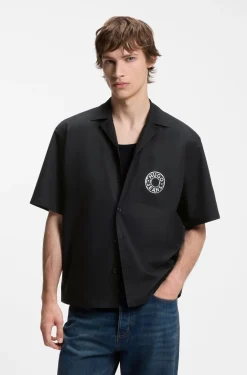 Relaxed-fit shirt with chest print and reverse lapels