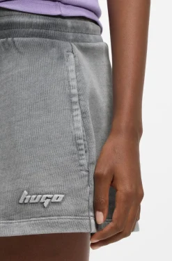 Relaxed-fit shorts in cotton terry with embossed logo