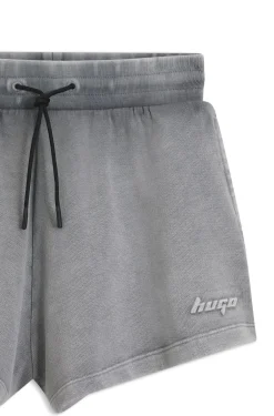 Relaxed-fit shorts in cotton terry with embossed logo