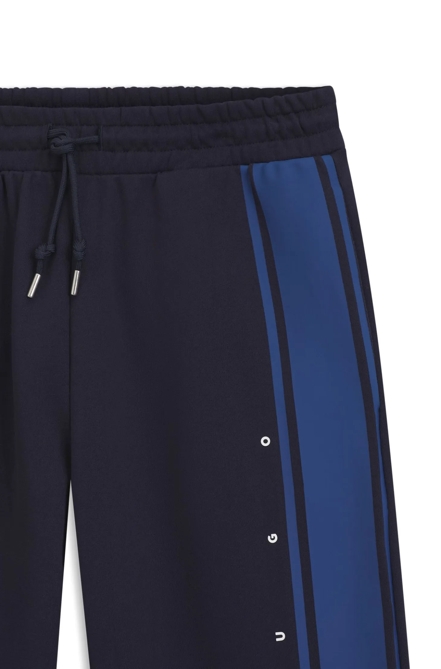 Relaxed-fit tracksuit bottoms in cotton with side stripe