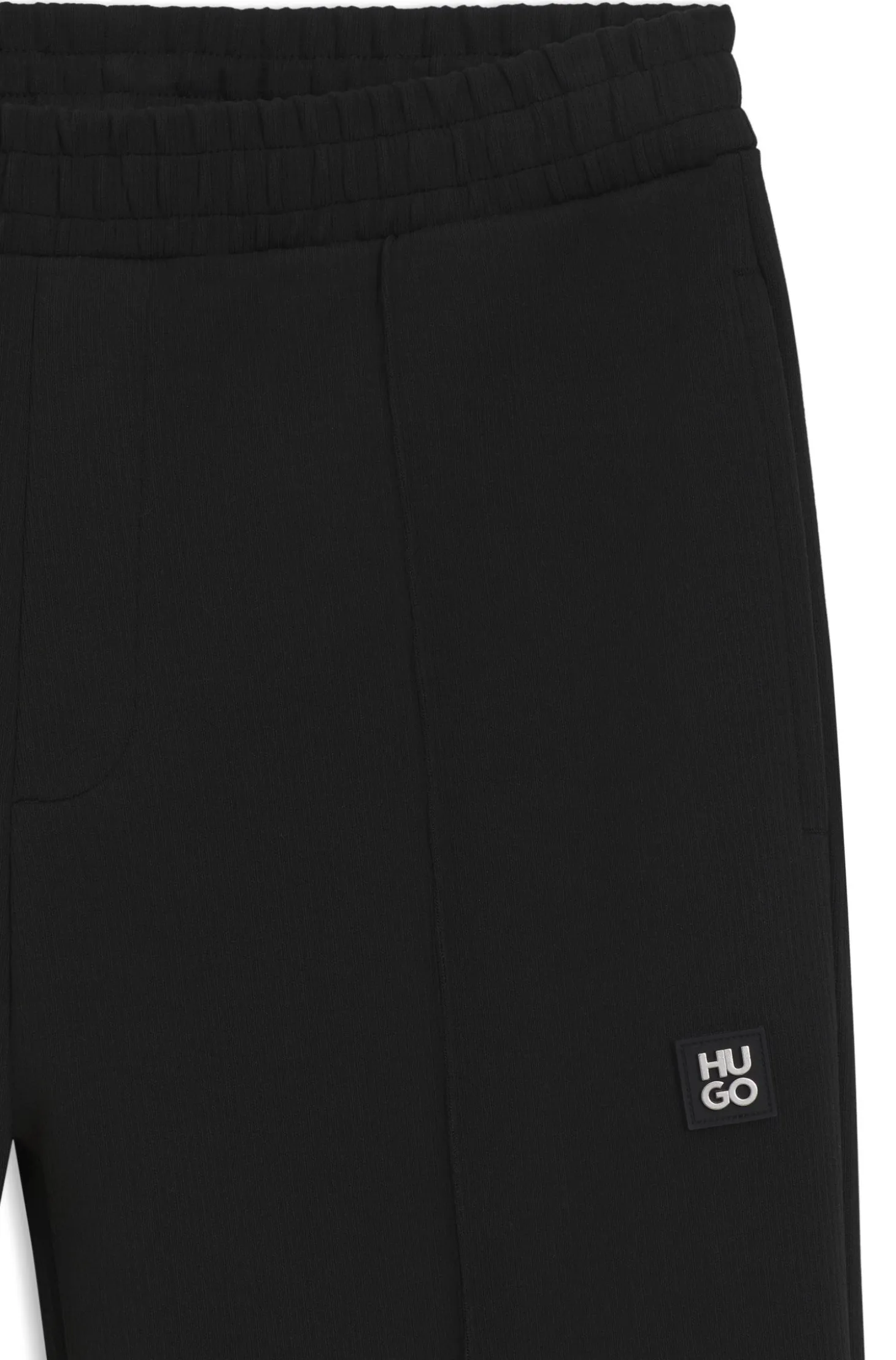 Relaxed-fit tracksuit bottoms in a structured cotton blend