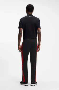 Relaxed-fit tracksuit bottoms with logo tape