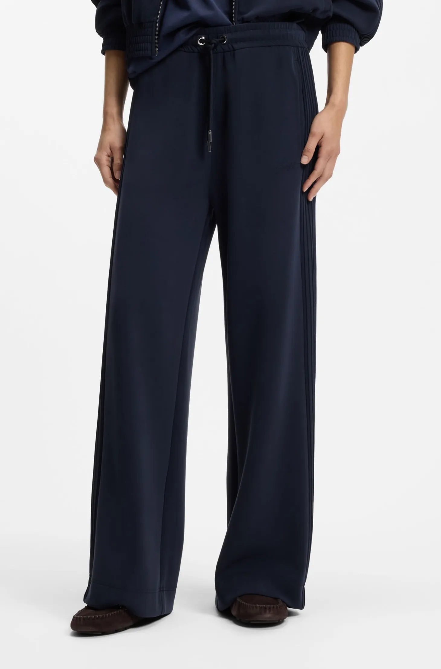 Relaxed-fit tracksuit bottoms with piping details