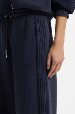Relaxed-fit tracksuit bottoms with piping details