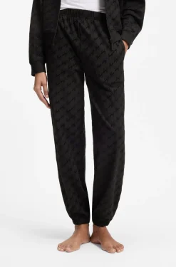 Relaxed-fit tracksuit bottoms with flocked-logo print