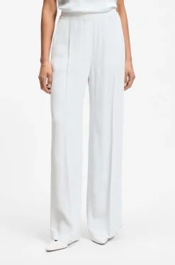 Relaxed-fit trousers in fluid crepe