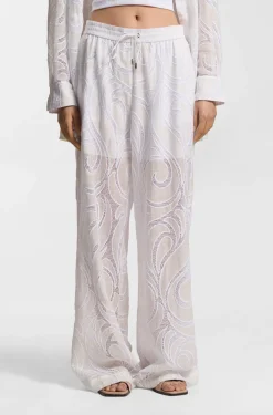 Relaxed-fit trousers with embroidered flowers