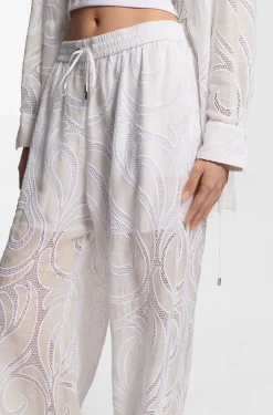 Relaxed-fit trousers with embroidered flowers