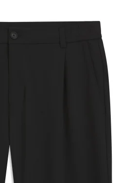 Relaxed-fit trousers with front pleats