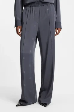 Relaxed-fit trousers with stacked logos