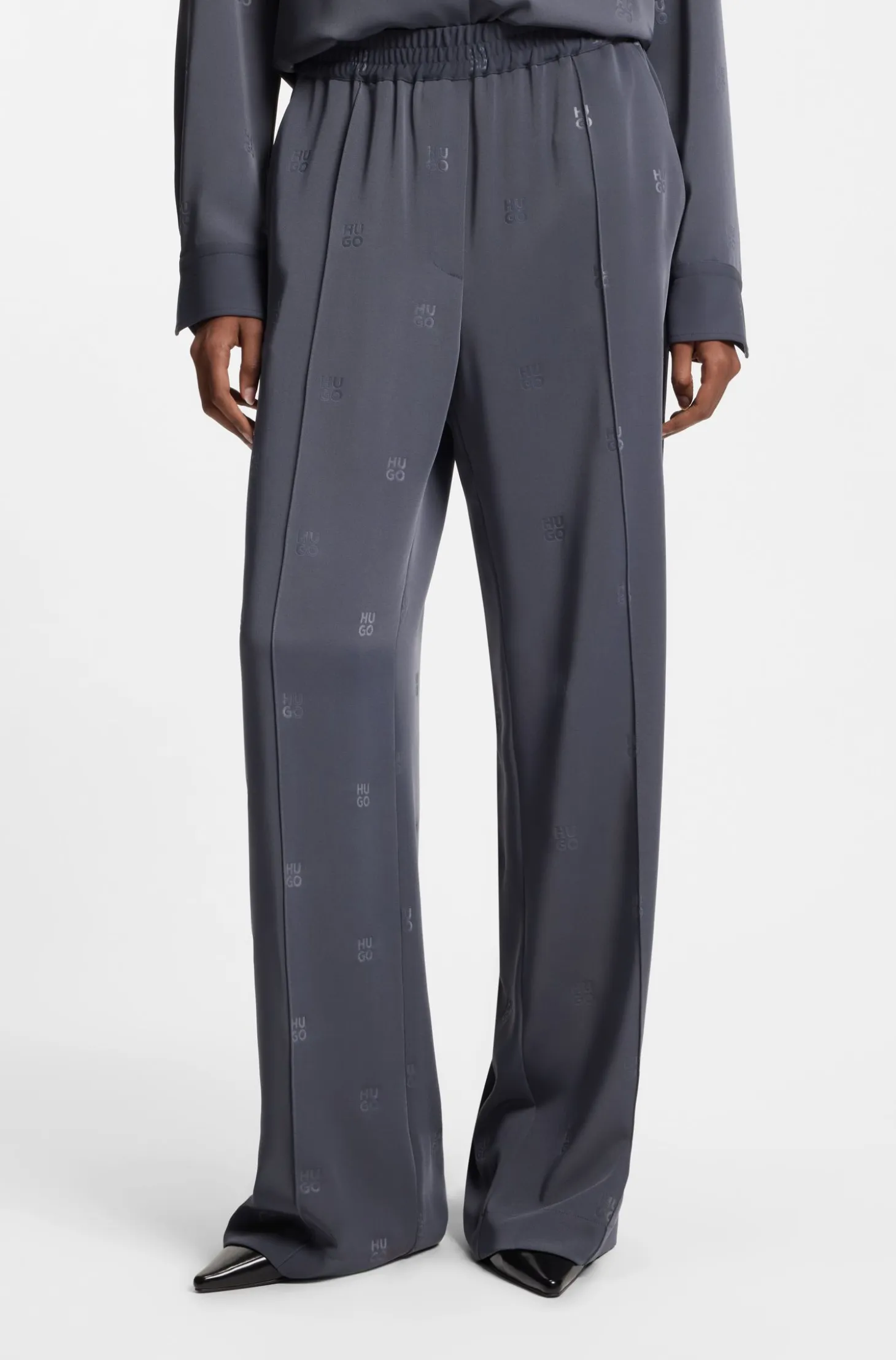 Relaxed-fit trousers with stacked logos