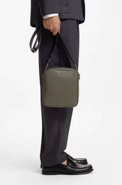 Reporter bag with silver-tone logo lettering