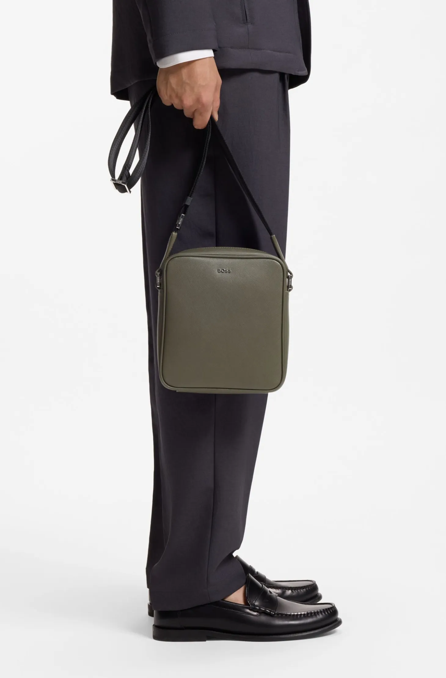 Reporter bag with silver-tone logo lettering