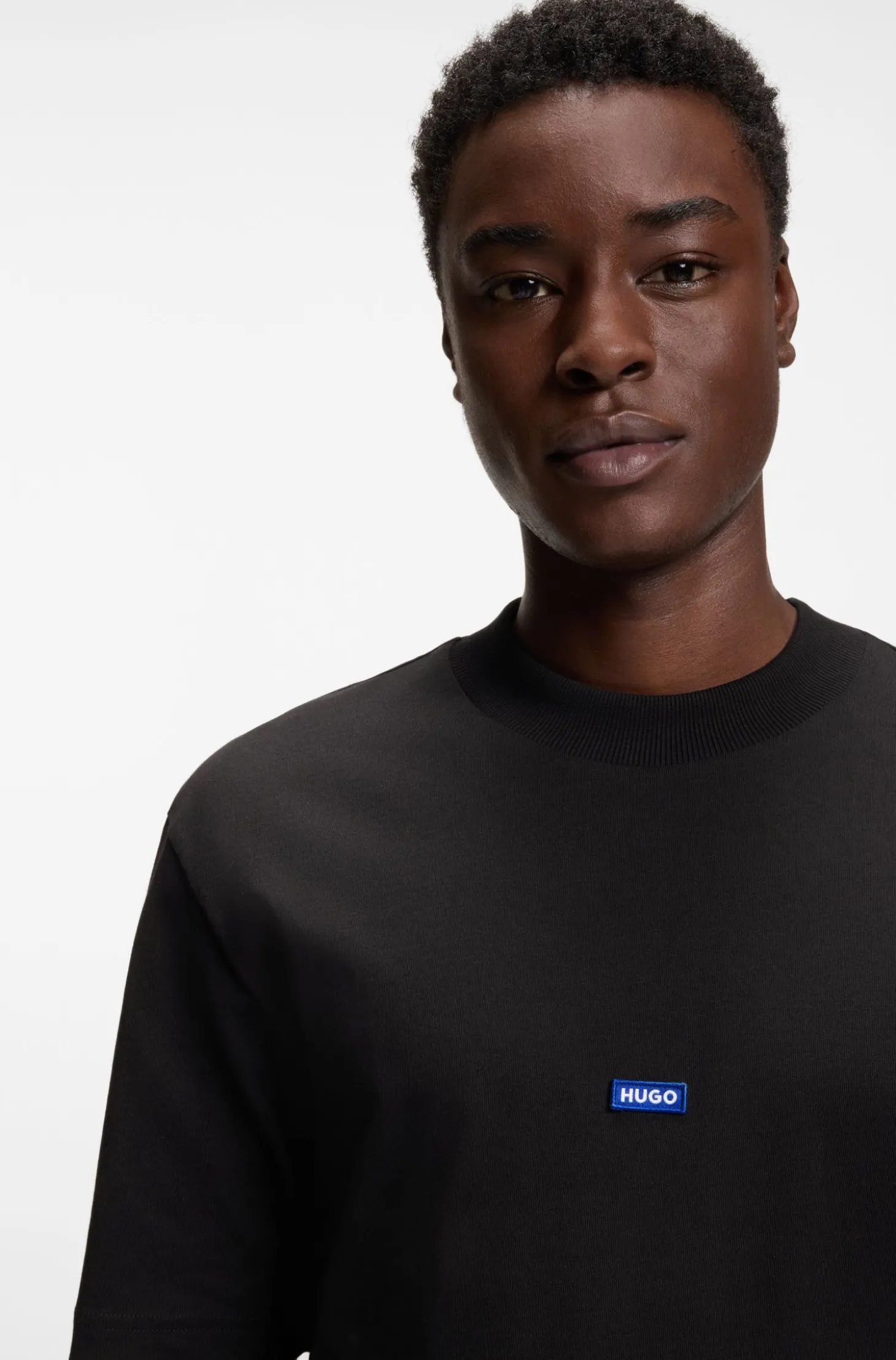 Ribbed-neck cotton T-shirt with logo badge