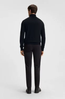 Rollneck sweater in cotton and cashmere with logo patch