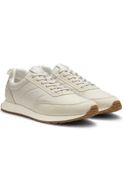 Running-inspired trainers with monogram-jacquard uppers