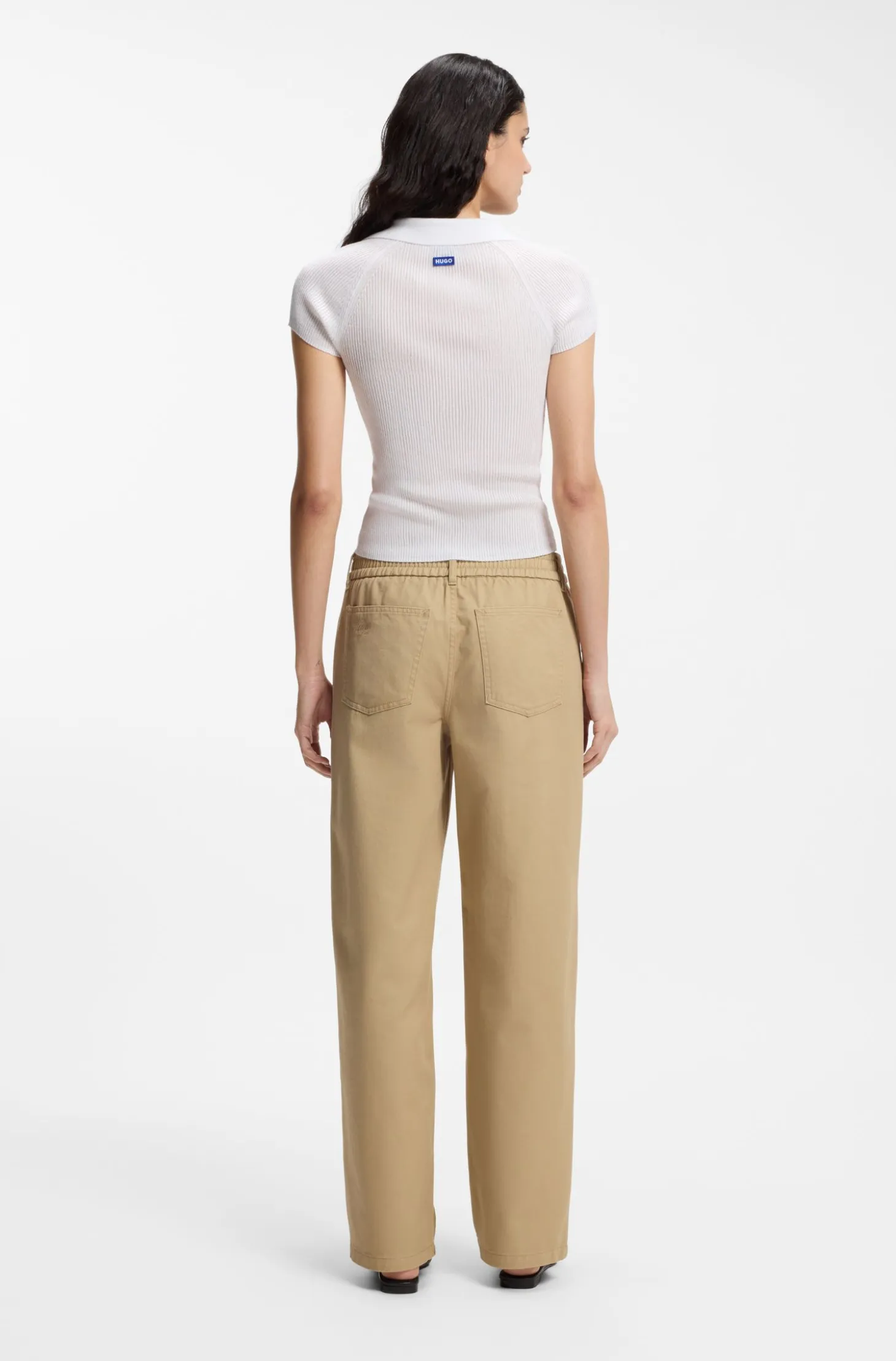 Short-sleeved sweater in stretch fabric with polo collar