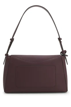 Shoulder bag in grained leather with logo plate