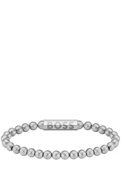 Silver-tone cuff with logo closure