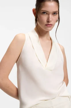 Sleeveless blouse in sandwashed silk with V neckline