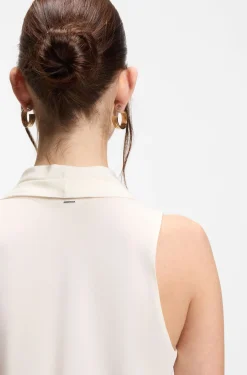 Sleeveless blouse in sandwashed silk with V neckline