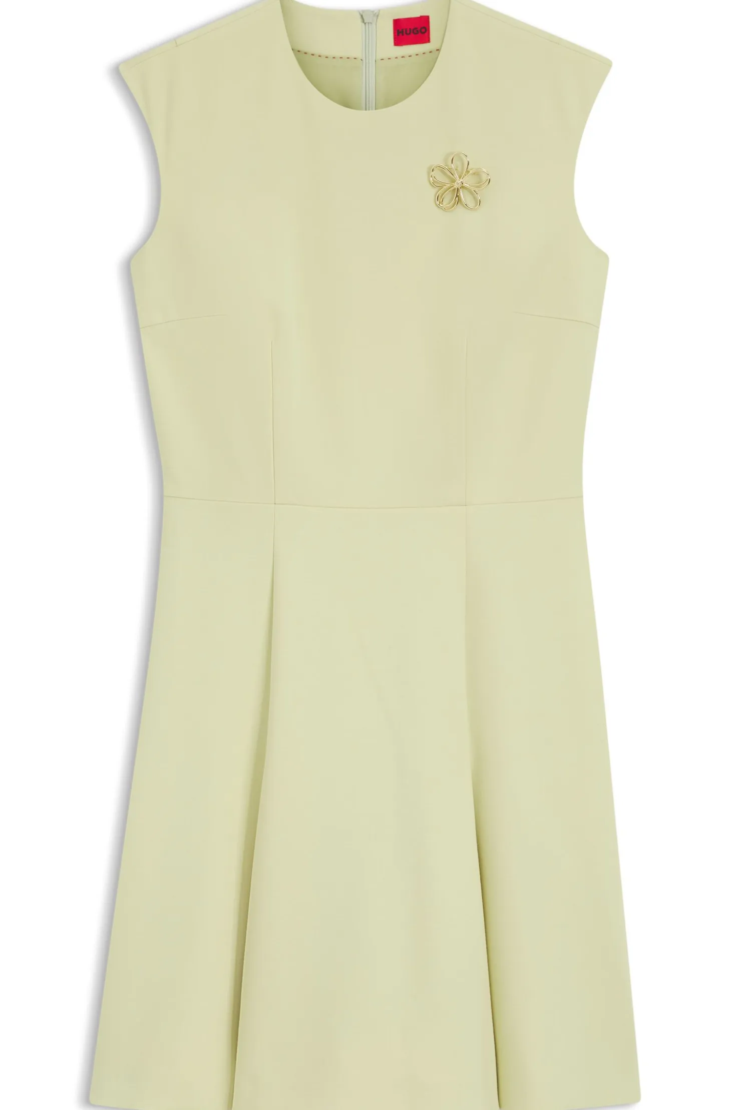 Sleeveless dress with gold-tone flower brooch