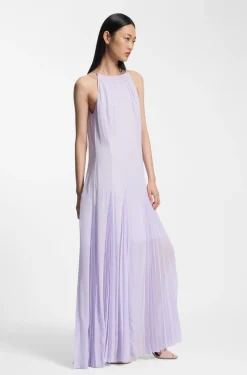Sleeveless dress with plissé skirt inserts