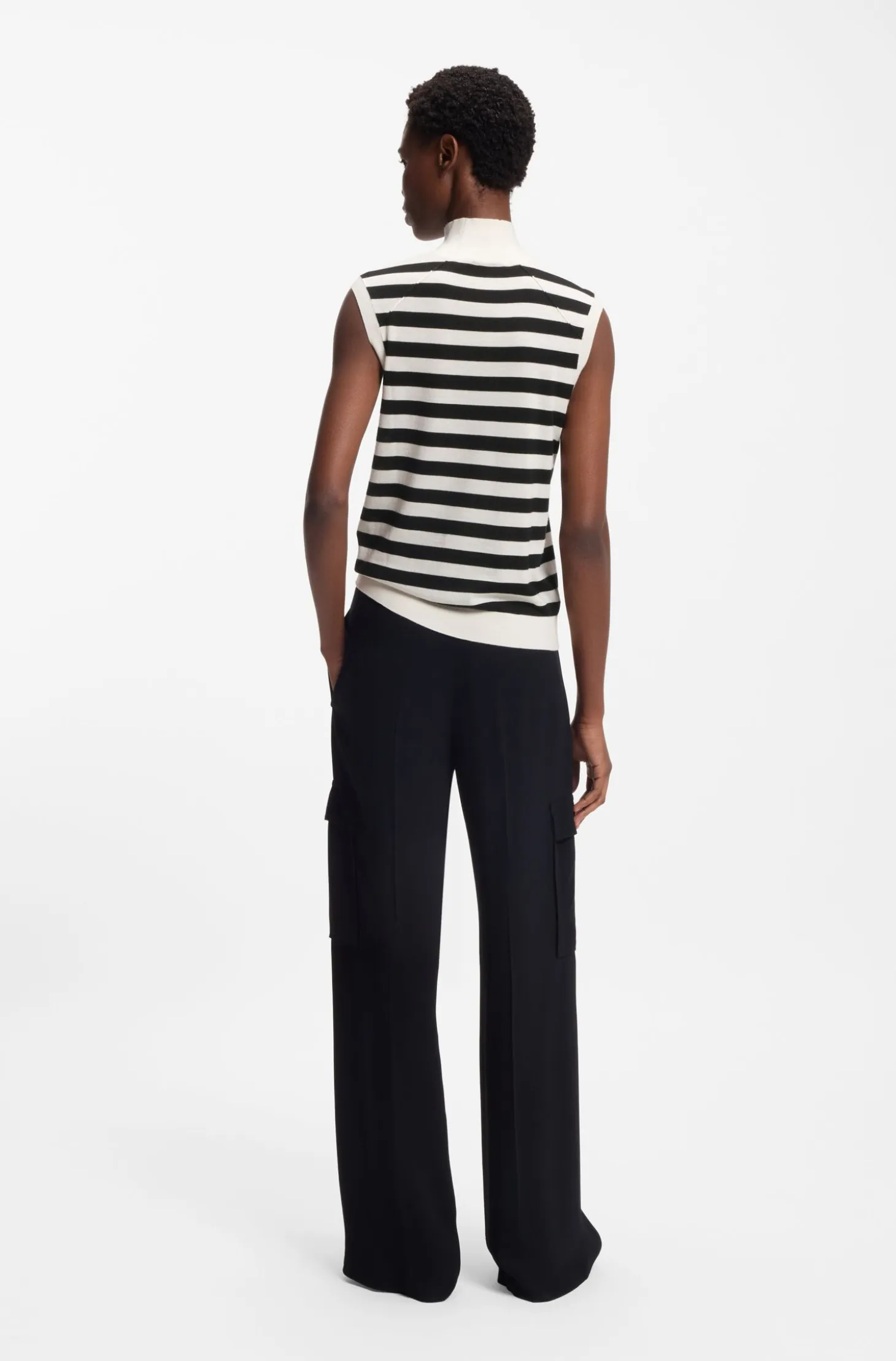Sleeveless mock-neck sweater in merino wool