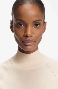 Sleeveless mock-neck sweater in merino wool