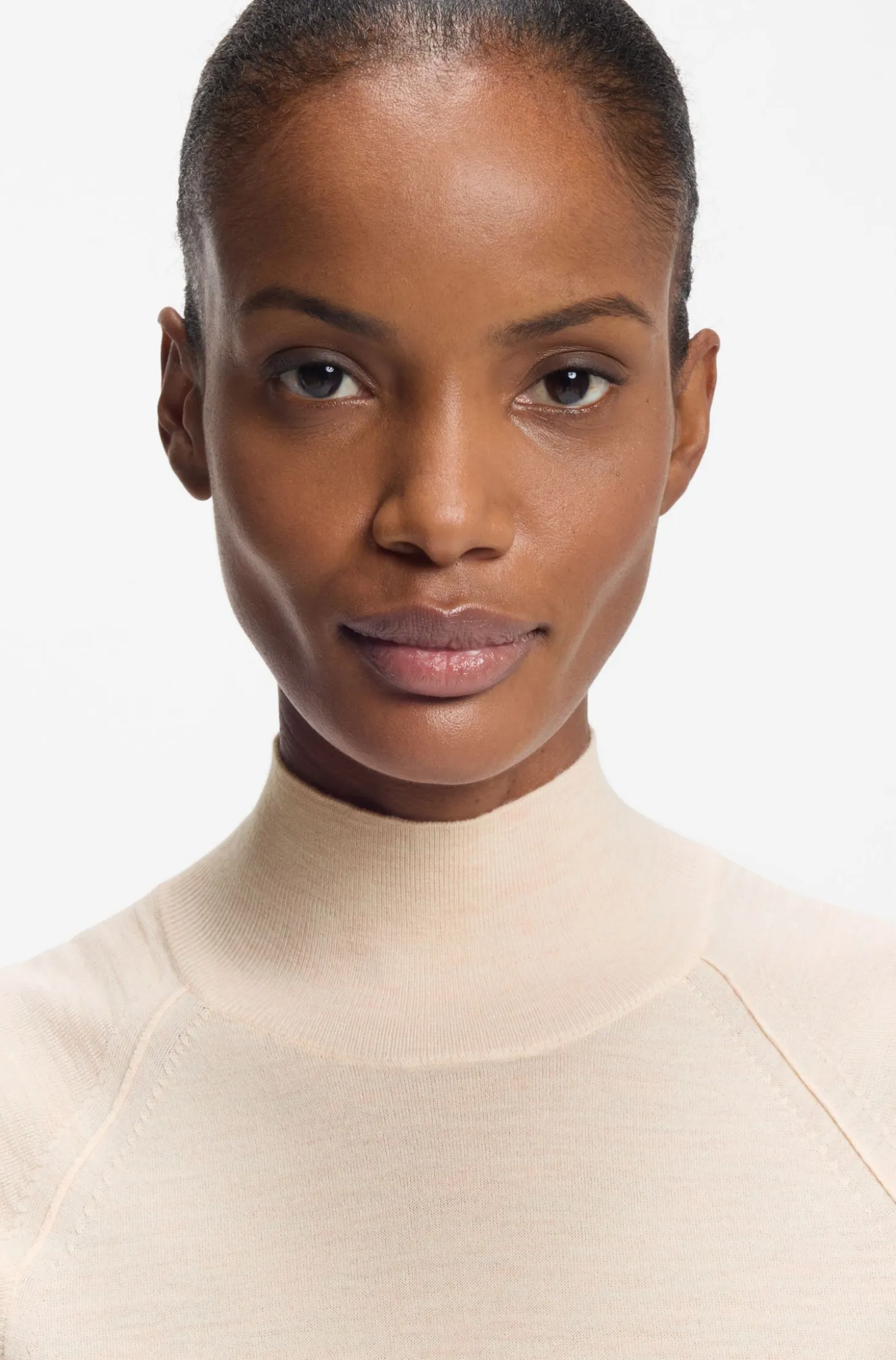 Sleeveless mock-neck sweater in merino wool